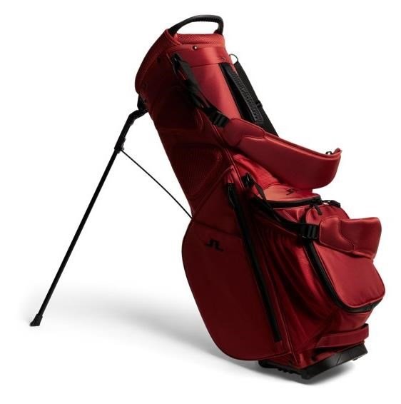 J.Lindeberg JL Flare golf bag in Bossa Nova red with stand deployed