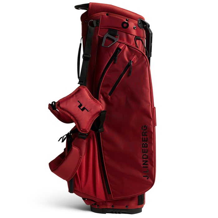 J.Lindeberg red golf bag on a white background